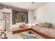 Bright bedroom with daybed, unique rug, and lots of natural light at 3098 Quail Crest Ave, Henderson, NV 89052
