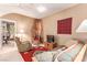 Comfortable bedroom featuring southwestern decor and a classic TV at 3098 Quail Crest Ave, Henderson, NV 89052