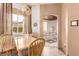 Bright dining area with window views, chandelier, and stylish decor at 3098 Quail Crest Ave, Henderson, NV 89052