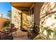 Inviting front porch with seating area, perfect for relaxing and enjoying the outdoors at 3098 Quail Crest Ave, Henderson, NV 89052