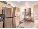 Eat-in kitchen features stainless steel appliances and adjacent dining area at 3098 Quail Crest Ave, Henderson, NV 89052