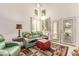 Bright and airy living room with high ceilings, French doors, and comfortable seating at 3098 Quail Crest Ave, Henderson, NV 89052