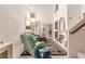Spacious living room with high ceilings, a fireplace, and comfortable seating at 3098 Quail Crest Ave, Henderson, NV 89052