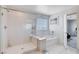 Bathroom features a bathtub, shower, and window for ample light at 3524 Crotone Ave, Henderson, NV 89044
