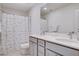 Bathroom features double sinks and a shower with a patterned curtain at 3524 Crotone Ave, Henderson, NV 89044