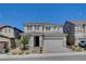 Beautiful two-story home with a two car garage, appealing to buyers at 3524 Crotone Ave, Henderson, NV 89044