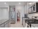 Well-equipped kitchen with stainless steel appliances and convenient pantry at 3524 Crotone Ave, Henderson, NV 89044