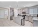 Modern kitchen featuring stainless steel appliances and white cabinetry at 3524 Crotone Ave, Henderson, NV 89044