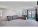 The living room is next to the dining area and has access to the patio, giving it a spacious feel at 3524 Crotone Ave, Henderson, NV 89044