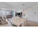 The living room is connected to the dining area, creating an open space for gathering at 3524 Crotone Ave, Henderson, NV 89044