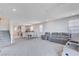 The living room and dining area are connected to the kitchen, creating an open space for gatherings at 3524 Crotone Ave, Henderson, NV 89044