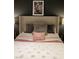 Cozy bedroom with plush bedding, decorative pillows, and soft ambient lighting at 353 E Bonneville Ave # 447, Las Vegas, NV 89101