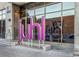 Exterior view of the building entrance and landscaping, with modern architectural details at 353 E Bonneville Ave # 447, Las Vegas, NV 89101