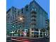 Modern building exterior with lots of glass and private balconies, offering a blend of city living and architectural style at 353 E Bonneville Ave # 447, Las Vegas, NV 89101