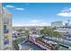 Scenic view of the city with vibrant buildings, palm trees, and a clear blue sky at 353 E Bonneville Ave # 447, Las Vegas, NV 89101