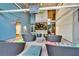 Interior lounge area with modern seating and a large screen, providing a comfortable space for entertainment and relaxation at 353 E Bonneville Ave # 447, Las Vegas, NV 89101