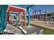 Relaxing pool area with lounge chairs, colorful cabanas, and resort-style amenities at 353 E Bonneville Ave # 447, Las Vegas, NV 89101