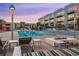 Exterior pool area with fire pit and lounge seating, creating a relaxing ambiance for enjoyment at 353 E Bonneville Ave # 447, Las Vegas, NV 89101