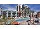 Beautiful condo complex with a pool and palm trees at 353 E Bonneville Ave # 447, Las Vegas, NV 89101