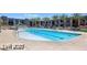 Exterior pool area offers a resort-like experience with pristine blue waters and comfortable lounge seating at 353 E Bonneville Ave # 447, Las Vegas, NV 89101