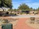 Outdoor community volleyball court area surrounded by desert landscaping and community walking path at 37 Buffalo Gap Ct, North Las Vegas, NV 89084