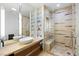 Spa-like bathroom with a glass shower, dual sinks, and contemporary fixtures at 3722 Las Vegas Blvd # 1709, Las Vegas, NV 89158