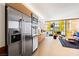 Modern kitchen featuring stainless steel appliances, sleek cabinets, and an open layout overlooking living area at 3722 Las Vegas Blvd # 1709, Las Vegas, NV 89158