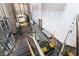 Elevated view of the hotel lobby and mezzanine showcases modern design, glass railings and monochrome decor at 3722 Las Vegas Blvd # 1709, Las Vegas, NV 89158
