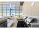 Modern outdoor kitchen with grill, island, and bar, perfect for entertaining with amazing views at 3722 Las Vegas Blvd # 1709, Las Vegas, NV 89158