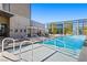 Luxurious rooftop pool and sundeck with city views, lounge chairs, and modern design at 3722 Las Vegas Blvd # 1709, Las Vegas, NV 89158
