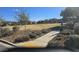 Common area with mature shrubbery, grass, and sidewalk in a well-kept community at 373 Wilford Springs St, Henderson, NV 89014