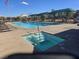 Sparkling community pool with lounge chairs and covered seating areas at 373 Wilford Springs St, Henderson, NV 89014