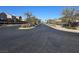 Wide street view showcasing the landscaped sidewalks and well-maintained neighborhood at 373 Wilford Springs St, Henderson, NV 89014