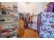 Walk-in closet featuring shelves and racks, providing ample storage space at 404 Via Sonador, Henderson, NV 89012