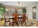 Bright dining area with light hardwood floors and elegant furnishings at 404 Via Sonador, Henderson, NV 89012