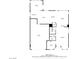 First-floor layout featuring an open-concept kitchen, living, and dining area with garage at 404 Via Sonador, Henderson, NV 89012