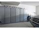 Spacious garage with ample storage cabinets and organization system at 404 Via Sonador, Henderson, NV 89012