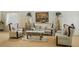 Refined living room with ornate furniture, detailed accents, and ample seating, perfect for entertaining guests at 404 Via Sonador, Henderson, NV 89012