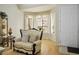 Cozy living room with comfortable seating and natural light, creating a warm and inviting space at 404 Via Sonador, Henderson, NV 89012