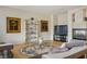 Bright living room with hardwood floors, fireplace, modern decor and natural light at 404 Via Sonador, Henderson, NV 89012
