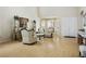 Spacious living room with elegant furnishings, high ceilings, and large windows, creating an airy and inviting atmosphere at 404 Via Sonador, Henderson, NV 89012