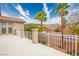 The expansive patio area features lush plants and landscaping at 404 Via Sonador, Henderson, NV 89012