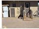 Backyard featuring a washer and dryer, a back entrance and an accessible ramp at 424 Jefferson Blvd, Henderson, NV 89011