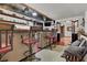 Entertaining bar with barstool seating and lounge area, great for hosting gatherings and enjoying refreshments at 5005 Harmony Ave, Las Vegas, NV 89107