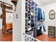 Well-organized walk-in closet featuring ample shelving and hanging space for clothing and accessories at 5005 Harmony Ave, Las Vegas, NV 89107