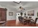 Elegant dining room with wood table and seating, ideal for hosting dinner parties and Gathering gatherings at 5005 Harmony Ave, Las Vegas, NV 89107