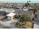 Overhead shot of single-Gathering home with mature tree, cozy front yard, and charming curb appeal at 5005 Harmony Ave, Las Vegas, NV 89107