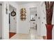 A hallway with neutral decor leads to bedrooms and bathrooms at 5005 Harmony Ave, Las Vegas, NV 89107