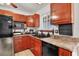 Well-equipped kitchen with ample counter space and modern appliances, perfect for everyday cooking at 5005 Harmony Ave, Las Vegas, NV 89107