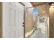 Exterior entry way that leads to a private patio with covered gazebo and outdoor seating area at 5005 Harmony Ave, Las Vegas, NV 89107